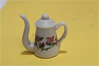 A Miniature Ceramic Teapot