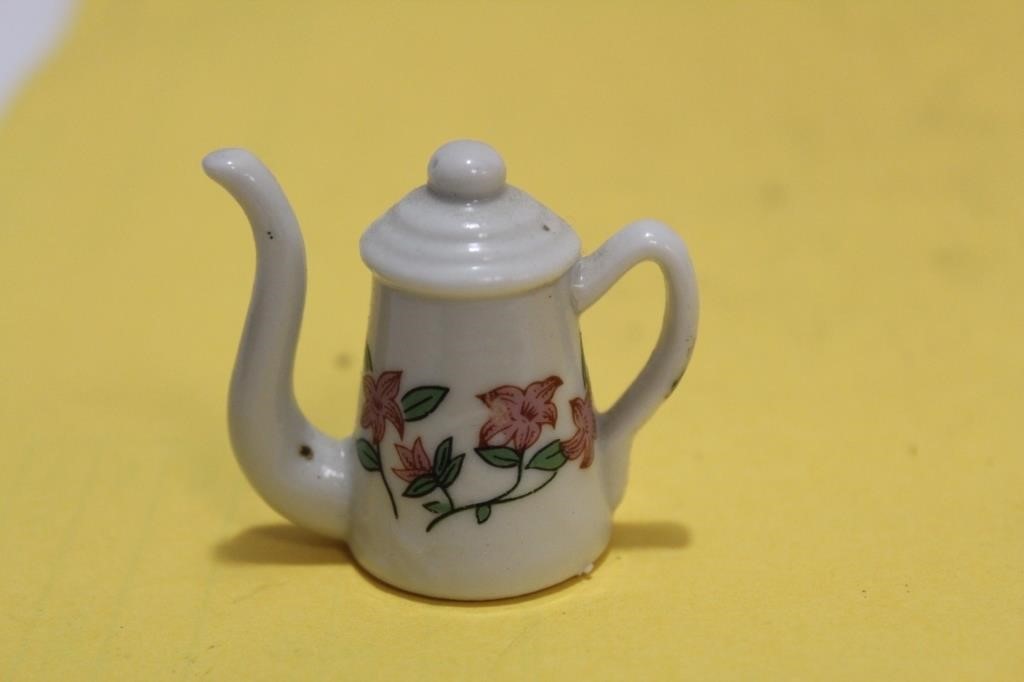 A Miniature Ceramic Teapot