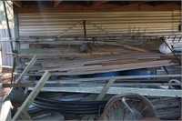 Lumber Pile Beside Shed