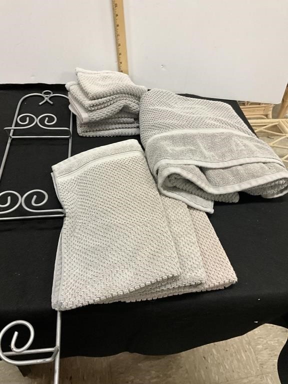 Bathroom towel set with stains, plate holder