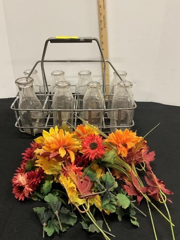 Antique milk crate, bottles, fake flowers