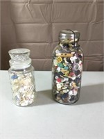2 jars full of buttons