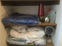 Sleeping bag, knicknacks, hurricane lamp, more