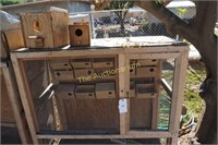 Pair of large cages with boxes