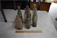 Six Old Glass Soda Bottles