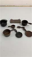 Cast iron Eagle pots & pans. Door cover