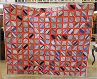 Hand Pieced and Hand Quilted String Block Quilt.