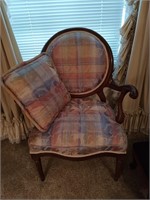 Pecan upholstered armchair with pillow