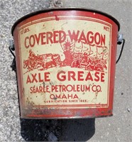 Covered wagon axle grease bucket