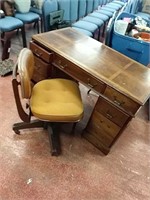 Vintage solid wood desk with vintage rolling chair