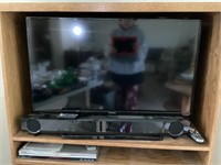 Entertainment center with Tv, Dvd & Vsh player