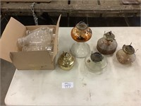 5 oil lamps and 5 glass chimneys