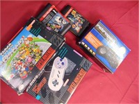 video games.  1 controller, 2 empty boxes, 2 Sega