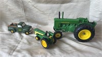 2 John Deere Toy Tractors and a John Deere Toy