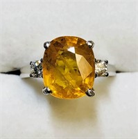 $7500. 10K Yellow Sapphire Diamond Ring