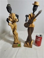 Hand carved statues (1 Arm missing)