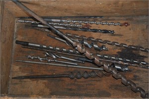 crate with auger and other drill bits