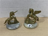 Brass unicorn and Pegasus on marble