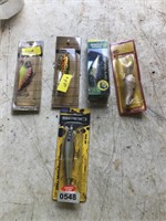 5 fishing lures and baits in packages