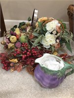 Artificial flowers and baskets and gold rim bowl