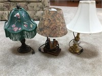 Three small table lamps