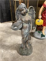 Angel w basket garden statue.