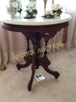 side table (oval with marble top and wooden legs)