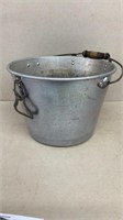 Vintage aluminum milk bucket