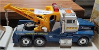BATTERY-OPERATED PLASTIC TONKA TOW TRUCK
