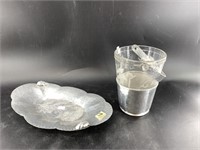 Small vintage ice bucket and an aluminum bread pla