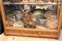Collectibles on Bottom Shelf of Curio Cabinet