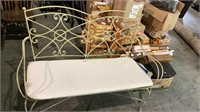Outdoor wrought iron love seat bench, with a