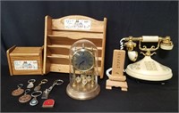 Box of dome clock, key chains, wood shelf and