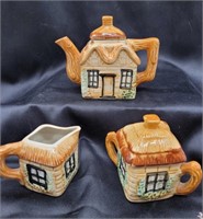Teapot, creamer and sugar bowl. Marked Japan.