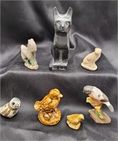 Small animal and bird figurines.