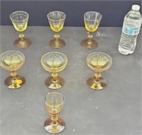 (7) pieces amber glass drinkware