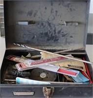Metal box with wire brushes,  sawzall blades