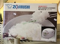 Zojirushi rice cooker and warmer -10 cup capacity.
