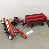 Red tractor, 4-bottom plow, flare wagon