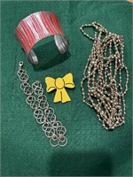 Two necklaces, cuff bracelet,