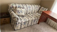 Floral hide a bed couch (on main floor)