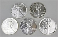 5 1987 One Ounce Fine Silver Eagles.