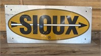 Sioux sign (metal building advertisement)