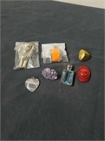Group of pendants and two buttons