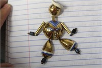An Articulated Sailor Brooch