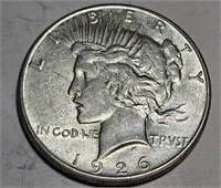 1926 s AU-BU Peace Silver Dollar