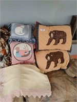 Assortment of Throw Blankets and Pillows
