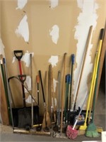 lot of brooms, magnets, squeegees, scoops, etc