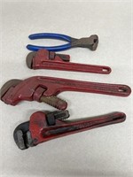 Pipe wrenches and  wire cutter