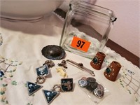 Jar of jewelry, fashion accessories
tie clips,